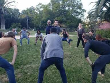 Improv Playground workshop participants laughing and playing together