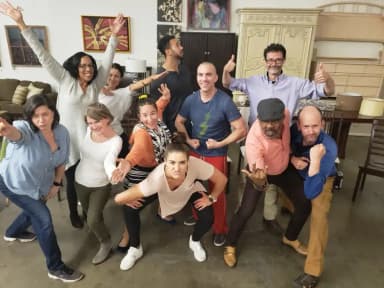 Improv Playground workshop participants laughing and playing together
