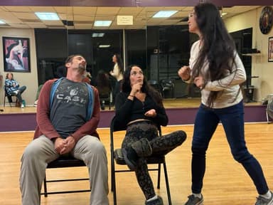 Improv Playground workshop participants laughing and playing together