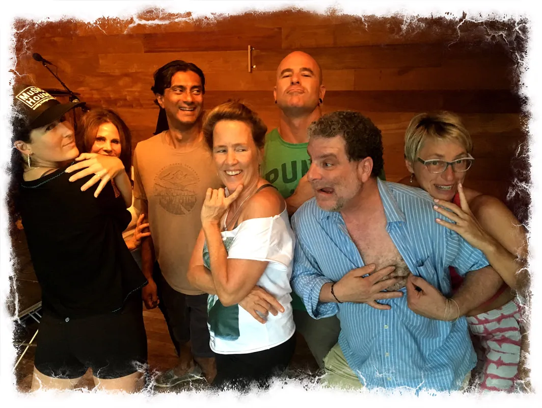 Intimate workshop group laughing and posing together